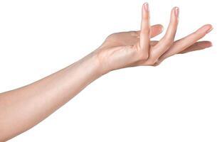 Elegant hand gesture demonstrating openness and grace in a neutral setting during daytime photo
