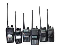 Multiple models of handheld walkie-talkies arranged in a row showcasing different designs and features photo