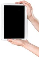 Hands holding a blank tablet in a well-lit space, perfect for digital creativity and presentations photo