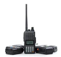 Various walkie talkies arranged in a group displaying different designs and features on a white background photo