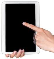 Person interacts with a touchscreen tablet highlighting technology usage in daily life photo
