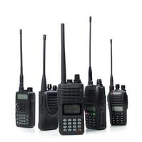 Collection of various handheld radio devices used for communication in different settings and environments photo