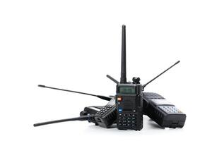 Multiple handheld radios arranged together in a creative display showcasing communication technology photo