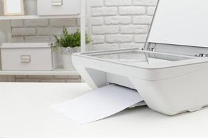 Home office setup highlights multifunction printer printing document in modern workspace photo