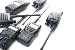Various handheld radios showcasing different models and features for effective communication during outdoor activities photo