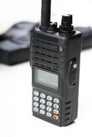 Handheld communication device used for radio transmissions in various settings and activities photo