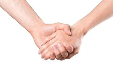 Two hands clasped together in a gesture of agreement and connection during an important conversation photo