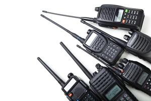 Collection of two-way radios displayed on a white background showcasing various designs and functions photo