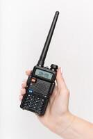 Handheld two-way radio with digital display and antenna for communication purposes photo