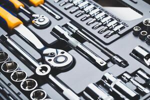 Comprehensive tool set arranged neatly on a flat surface displaying various sizes and types for different tasks photo