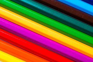 Brightly colored crayons arranged in a vibrant display highlighting shades of creativity and artistic expression photo