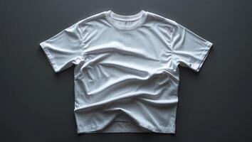 White short sleeve t-shirt placed on a flat surface, showcasing its texture and simplicity photo