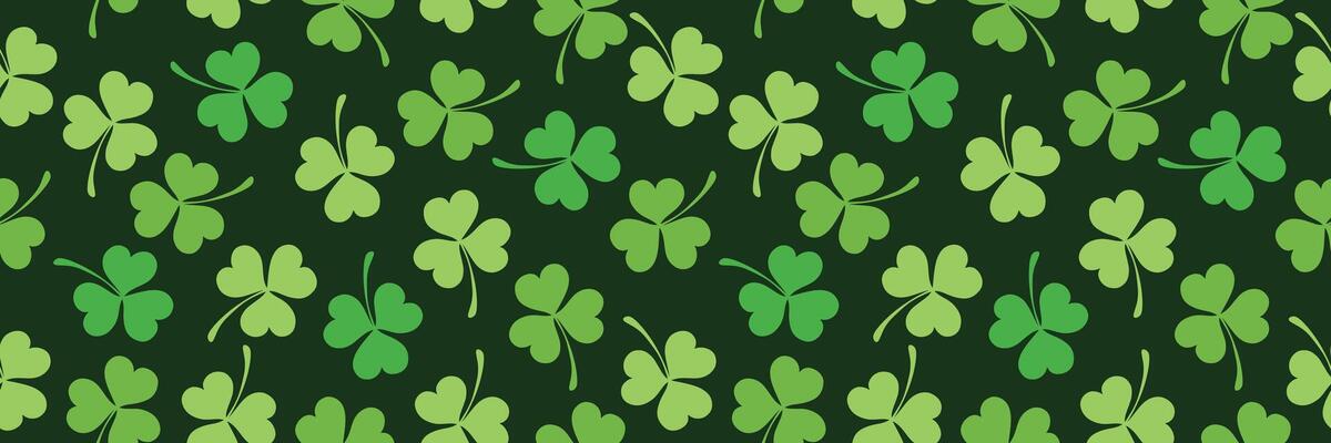 Seamless pattern of clover leaves for St. Patrick's Day. Clover leaves on green background. Suitable for wrapping paper, wallpaper, background, card and decoration. Simple stylized plant elements