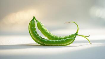 Fresh green pea pods with peas highlighted in sunlight creating a natural and vibrant display photo