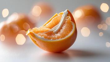 Fresh citrus fruit split open showcasing juicy segments and bright color in a soft bokeh background photo