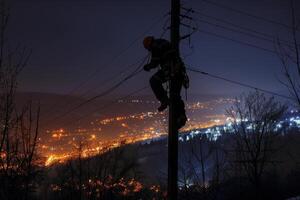 A man is working on a power line photo