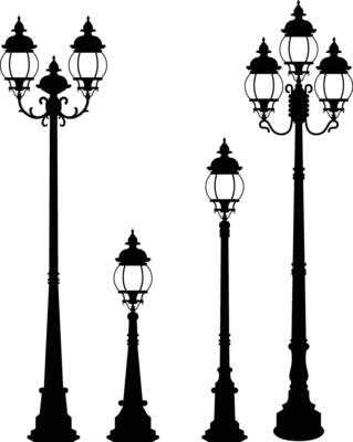 Four round street lights are displayed in a row, all black