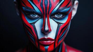 A woman with a face painted with red and blue photo