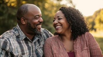 Couple in park laughing photo