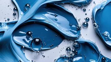 A blue liquid is being poured into a bowl photo