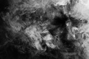 A man's face is obscured by smoke, creating a sense of mystery and unease photo
