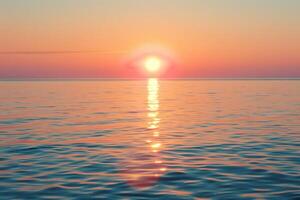 The sun is setting over the ocean in this image photo
