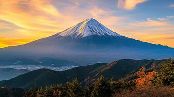Breathtaking view of Mount Fuji at sunset, surrounded by lush mountains and vibrant skies. photo