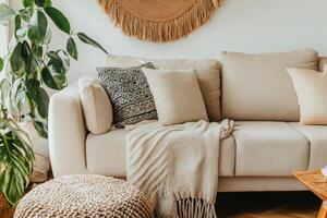 Cozy Beige Sofa with Knitted Throw and Macrame Wall Decor photo
