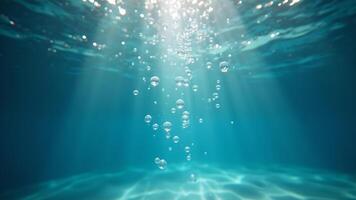 Underwater Bubbles with Sun Rays in Ocean Depth photo