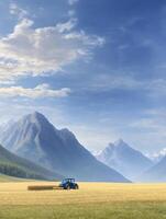 A blue tractor in a field with mountains in the background photo
