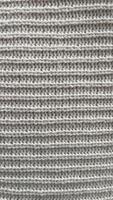 A knitted item with a white background.7 photo