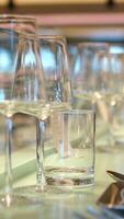 table set for holiday. birthday. Close-up of wine glasses on a table. served table before the holiday. snacks prepared for food. waiting for guests. buffet reception. sandwiches and brusettes video