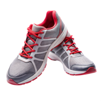 Pair of gray and red running shoes on a black background, symbol of athletic performance. png