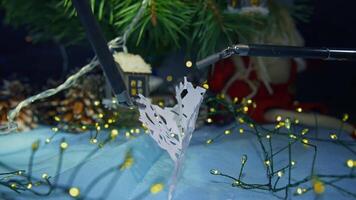 Modern robotic equipment for surgical operations unfold the paper clip. Christmas decorations with the help of innovative futuristic system. Close up. video