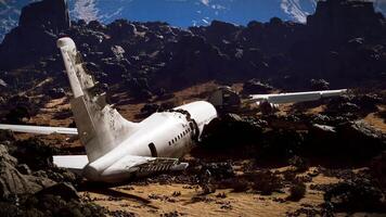 Plane crash site in mountainous terrain with wreckage scattered around video