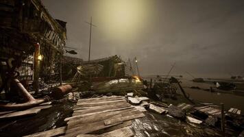 Quirky waterfront structures illuminated by dim light at dusk video