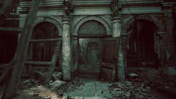 Abandoned building with crumbling architecture in overgrown landscape video