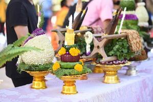 A table with a variety of food and flowers photo
