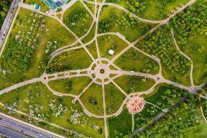 View from the height of the loshitsky Park in Minsk.Winding paths in loshitsky Park.Belarus.Apple orchard photo