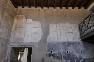 Ercolano, Italy, 2024 Well preserved wall paintings inside homes and palaces of Herculaneum were protected for 2000 years under the volcanic ash and pumice from the Mount Vesuvius eruption in 79 AD.. photo