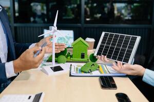 Business team people planning hand using laptop for working technology and business Net zero and carbon neutral concept.NET ZERO icons photo