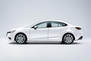 Compact sedan in studio with clean white background showcasing its sleek design photo