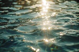 Radiant sunlight creating patterns on the water surface of swimming pool photo