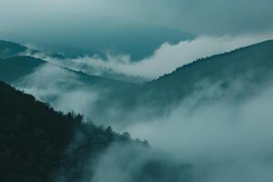 Landscape Ethereal fog covered valley with distant mountains peeking through the mist   nature background photo