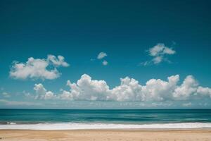 Golden Sand Beach with Turquoise Waters Under a Clear Blue Sky and Fluffy White Clouds   nature background photo