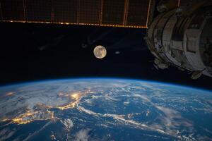 Full Moon Rising Above Earths Horizon from International Space Station photo