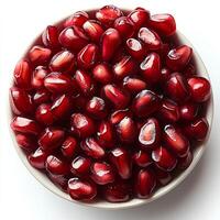 pomegranate piecesisolated on white background with shadow. autumn fall harvest of ripe pomegranate fruit full of juice photo