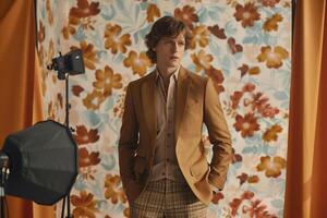 portrait of Handsome Male Model in Classy Suit with patterned Background Modern Fashion photo