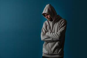 Charcoal Blue Maleswear Hoodie Urban Lifestyle portrait Featuring Subtle Fashion Tones and Stylish Male Look photo