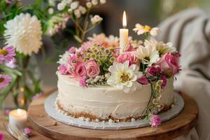 Elegant Cake with Candle and Memorial Bouquet Arrangement photo